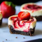 Mini Strawberry Swirl Cheesecakes